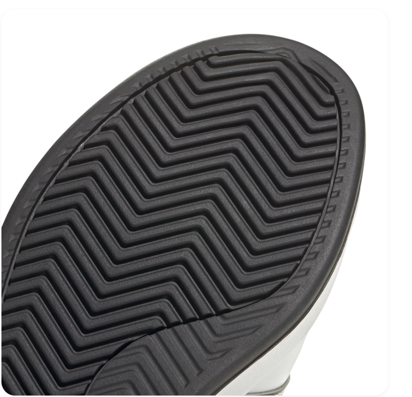 Adidas White Low-Top Sneakers with Black-Outlined Stripes and Black Laces