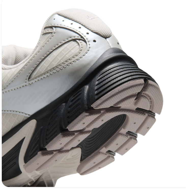Nike Cream and Metallic Silver Sneakers with Black Sculpted Sole