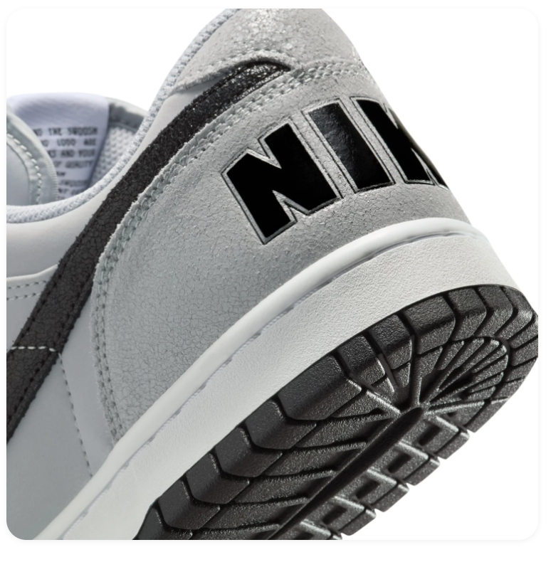Nike Light Grey Low-Top Sneakers with Black Swoosh