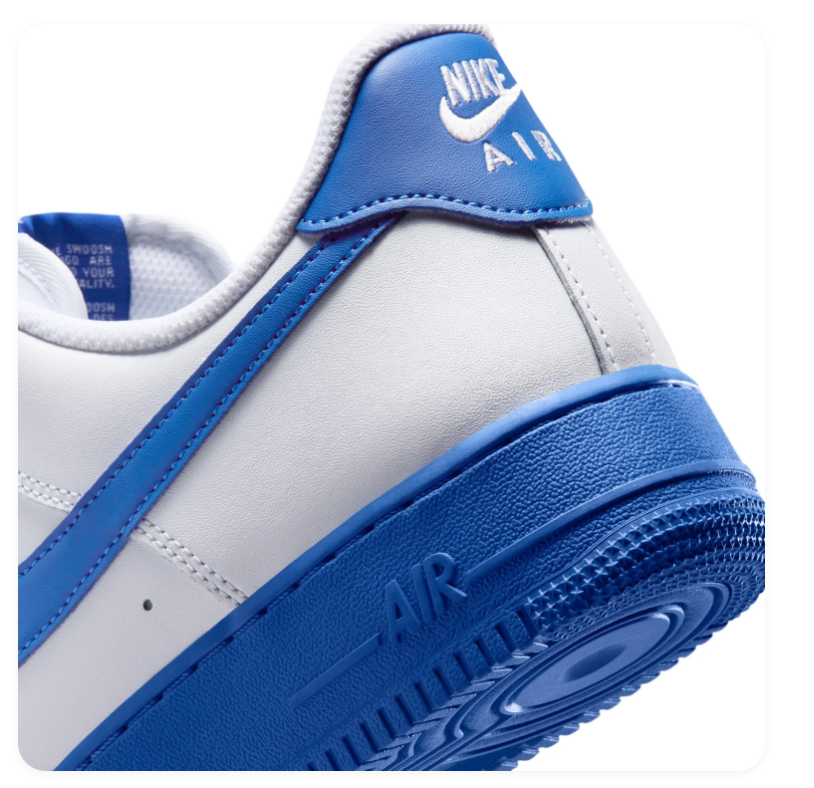 Nike Air Force 1 White Low-Top Sneakers with Blue Swoosh and Sole