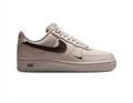 Nike Air Force 1 Light Taupe Low-Top Sneakers with Dark Brown Swoosh