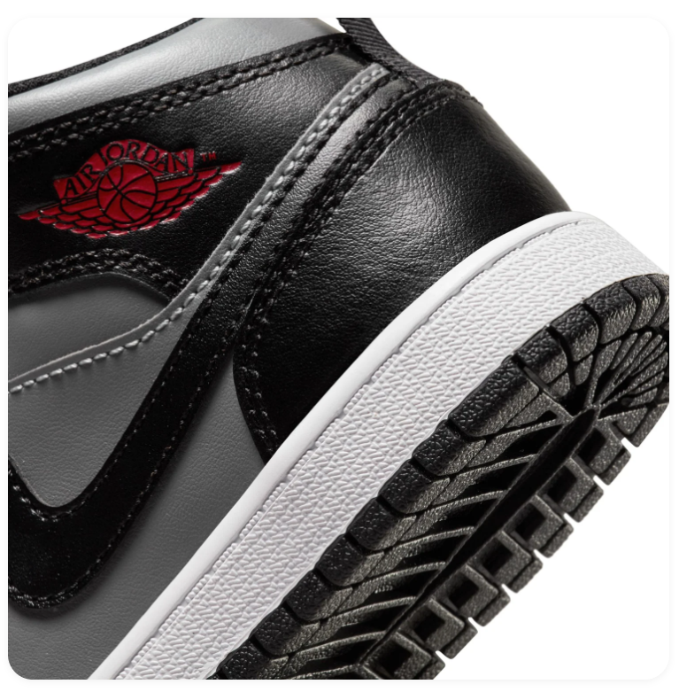 Air Jordan 1 Mid Black and Grey Sneakers with Red Accents