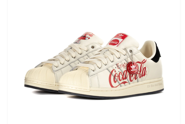 Adidas Superstar Cream Sneakers with Red Coca-Cola Graphics and Black Heel Tabs