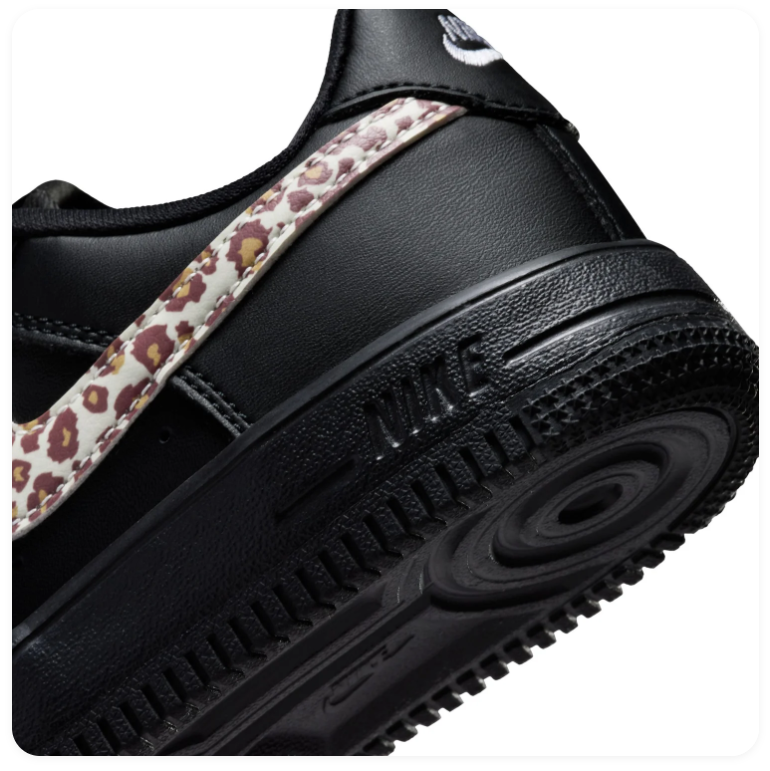 Nike Air Force 1 Black Low-Top Sneakers with Leopard Print Swoosh