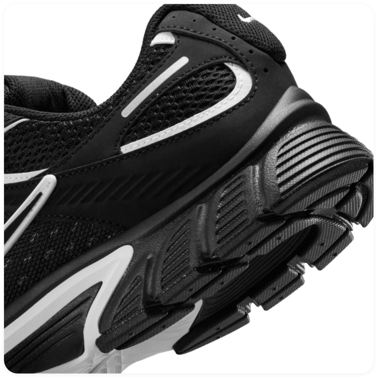 Nike Black Mesh Sneakers with Silver Accents and Chunky Sole