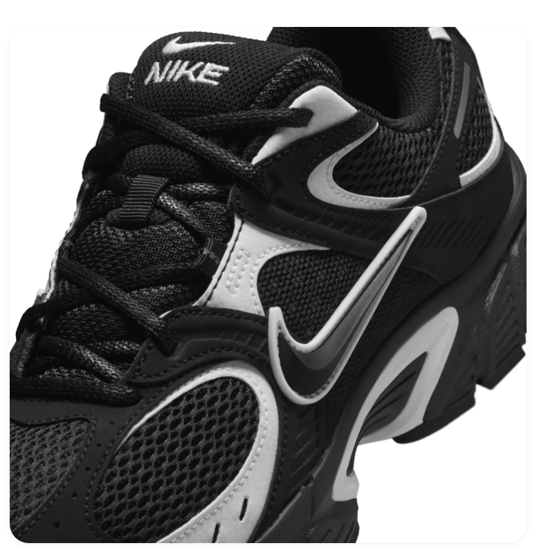 Nike Black Mesh Sneakers with Silver Accents and Chunky Sole