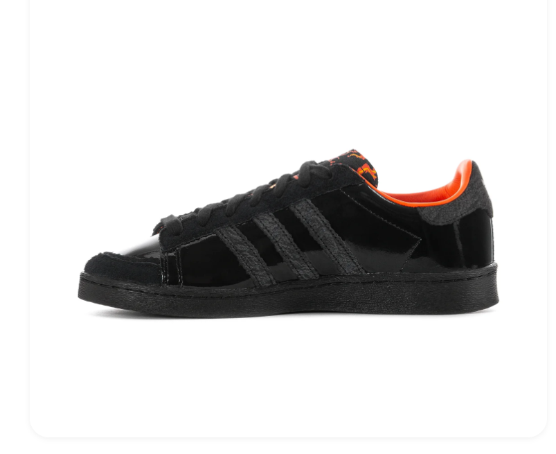 Adidas Black Low-Top Sneakers with Orange Lining and Graphic Tongue