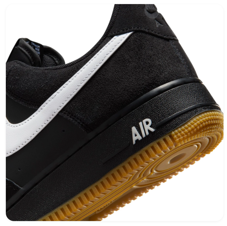Nike Air Force 1 Black Sneakers with White Swoosh and Gum Sole