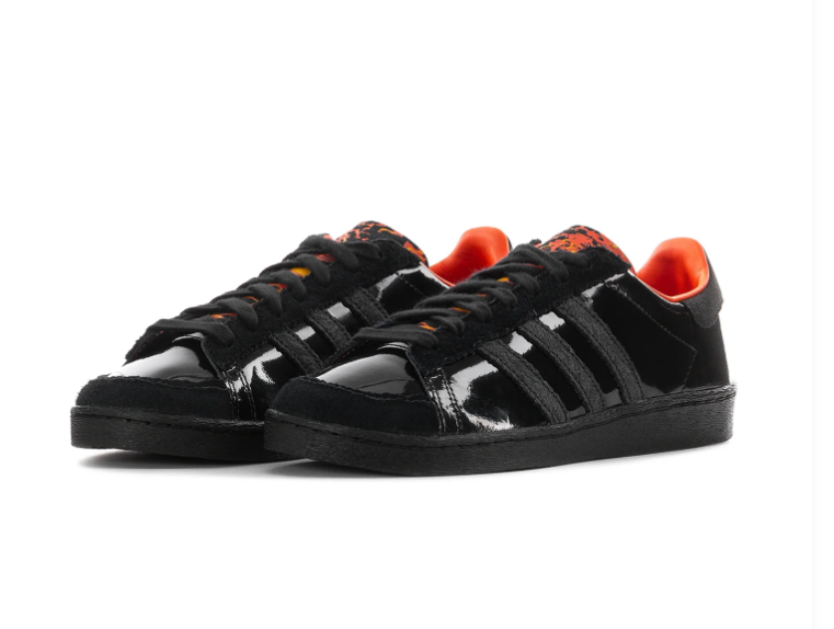 Adidas Black Low-Top Sneakers with Orange Lining and Graphic Tongue
