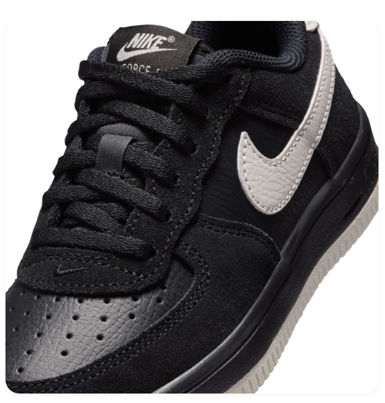 Nike Air Force 1 Black Low-Top Sneakers with Cream Swoosh and Sole Trim