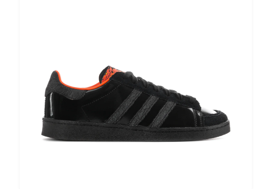 Adidas Black Low-Top Sneakers with Orange Lining and Graphic Tongue