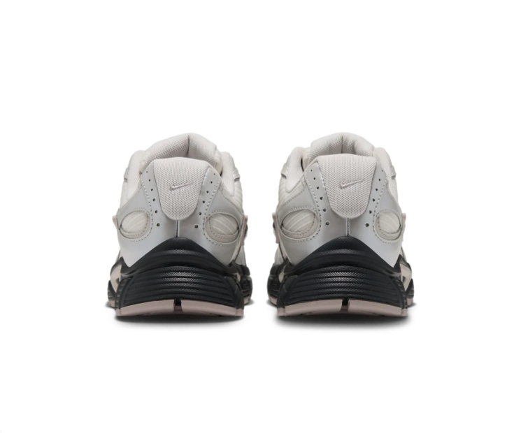Nike Cream and Metallic Silver Sneakers with Black Sculpted Sole