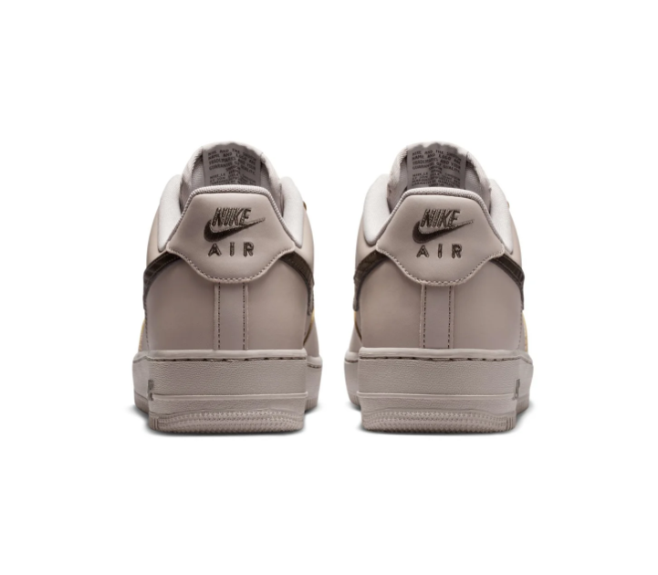 Nike Air Force 1 Light Taupe Low-Top Sneakers with Dark Brown Swoosh