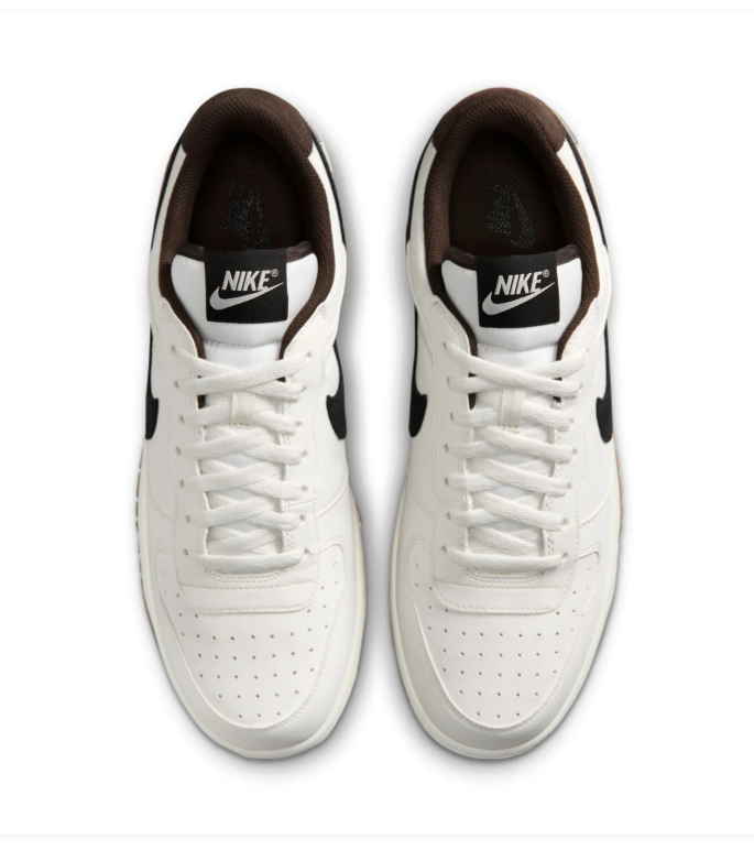 Nike White and Cream Low-Top Sneakers with Black Swoosh and Gum Sole