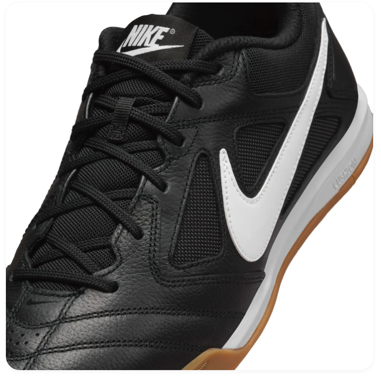 Nike Black Low-Top Sneakers with White Swoosh and Gum Outsole
