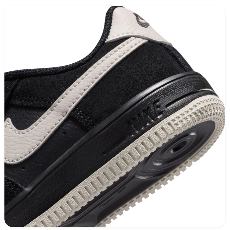 Nike Air Force 1 Black Low-Top Sneakers with Cream Swoosh and Sole Trim