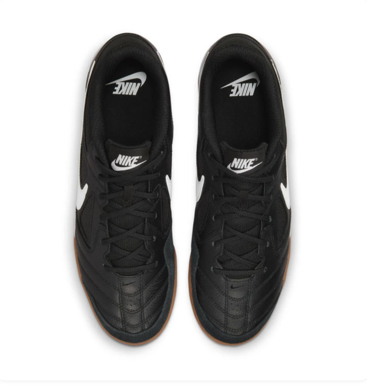 Nike Black Low-Top Sneakers with White Swoosh and Gum Outsole